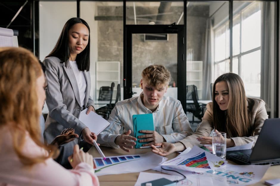 A team working together at a corporate workshop
