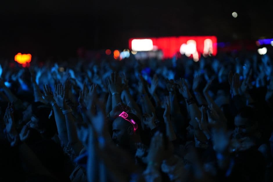 A crowd at an event, the audience a sponsor is paying to reach